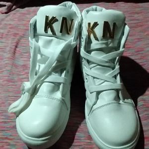 White women's leather tennis shoes